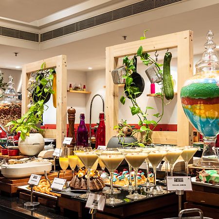 Mercure Hyderabad Kcp Banjara Hills, An Accor Hotel Kültér fotó A dessert buffet at a hotel in India