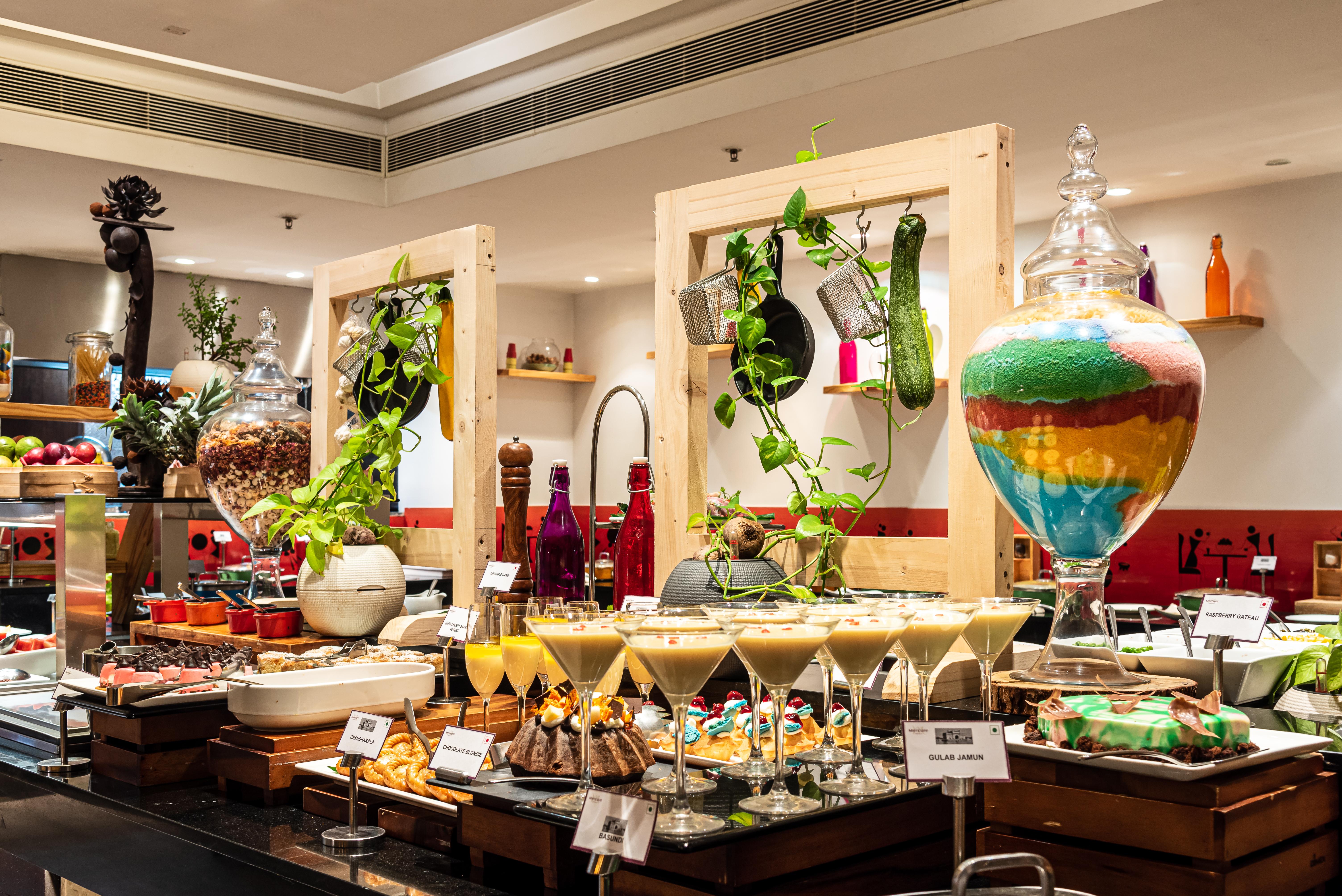 Mercure Hyderabad Kcp Banjara Hills, An Accor Hotel Kültér fotó A dessert buffet at a hotel in India